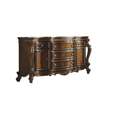  69" Brown Solid and Manufactured Wood Five Drawer Triple Dresser