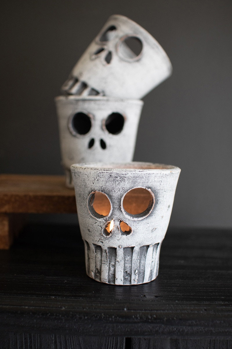SET OF THREE HALLOWEEN SKULL VASES