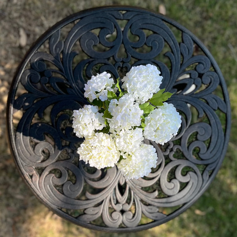 White hydrangeas arrangement in vase
