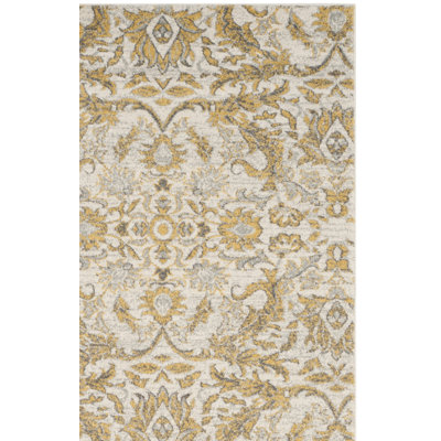 Tapis ivoire et doré damassé Adie