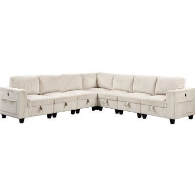 Canapé d'angle 7 en bois massif avec revêtement en velours côtelé beige et rangements latéraux. Ports de chargement inclus.