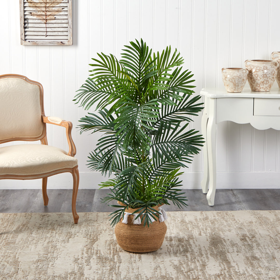 4ft. Areca Artificial Palm Tree in Boho Chic Handmade Natural Cotton Woven Planter with Tassels UV Resistant (Indoor/Outdoor) Primrue
