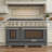 KUCHT Professional 48 in. 6.7 cu. ft. Natural Gas Range Two Ovens - One Convection - in Cement Gray with True Simmer Burners-97805575-97805576