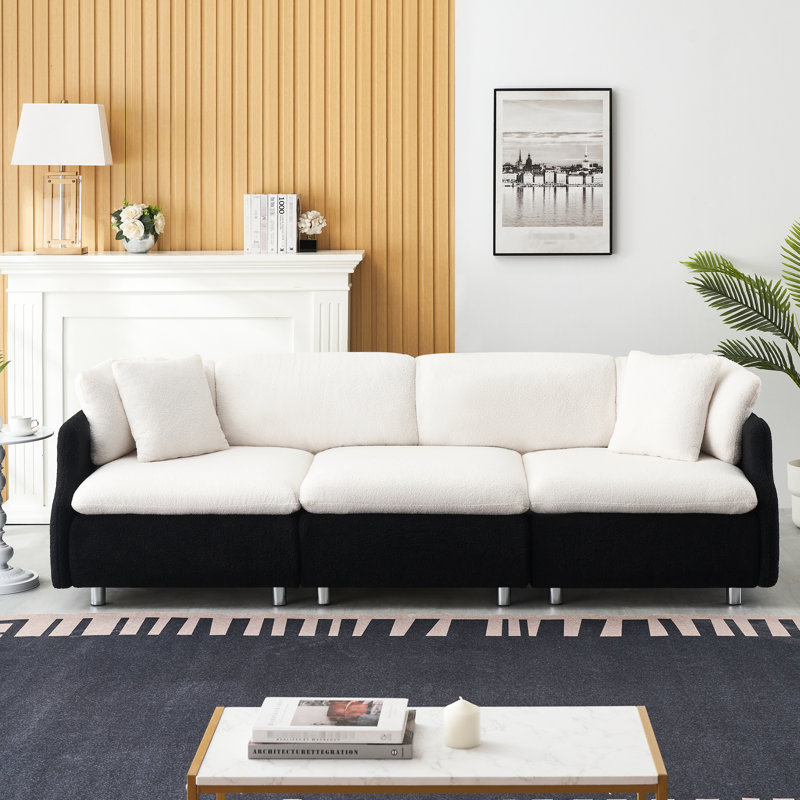 3 avec velours doux, 2 coussins noirs et blancs, créant un espace de vie paisible et moelleux blanc, confortable pour la chambre
