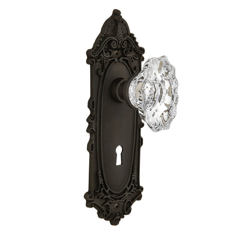 Plaque victorienne avec trou de serrure décoratif et poignée de porte de château, Bronze frotté à l'huile