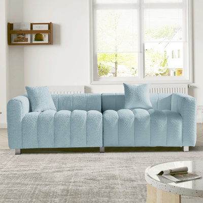 Canapé 3 places en velours capitonné de 212 cm (83,46 po), style bulle, avec base en métal et 2 coussins, idéal pour la chambre ou le salon. Modulable et polyvalent, il offre une assise ergonomique et confortable, et un style moderne et élégant.