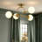 4-Light Iron Flush Mount Ceiling Light with Frosted Glass Globes
