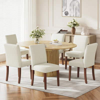 Ensemble de table de salle à manger moderne extensible pour 4 à 12 personnes avec rangement caché, table convertible ronde à ovale et chaises rembourrées en tissu