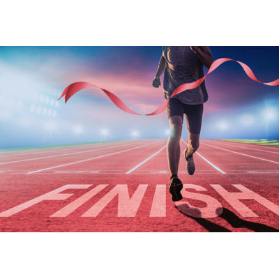 Runner At The Finish Line. by Panya Riamthaisong - Wrapped Canvas Print