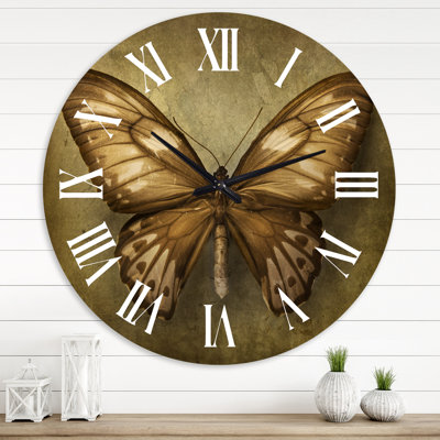 Papillon rétro dans des tons de terre - horloge murale rétro