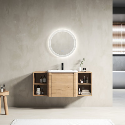 Meuble-lavabo mural de 122 cm (48 po) avec lavabo en céramique blanche, étagères de rangement et charnières à fermeture douce. Livré démonté, emballé dans du contreplaqué. Poignées à rebord incliné de 114 cm (45 po). Style bohème.