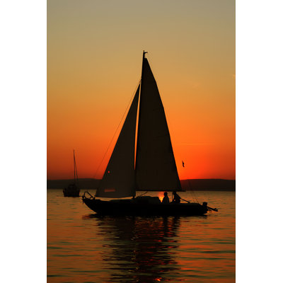 Sansa Sunset And Boat - Wrapped Canvas Print
