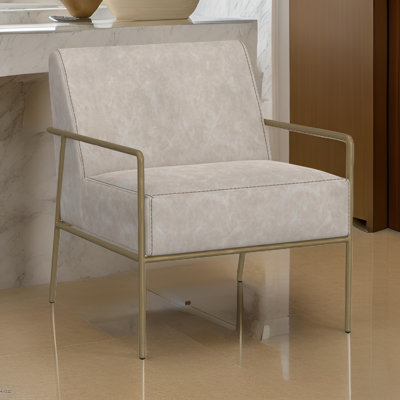 Fauteuil d'appoint Zili, similicuir, mousse moelleuse, finition en métal doré élégant