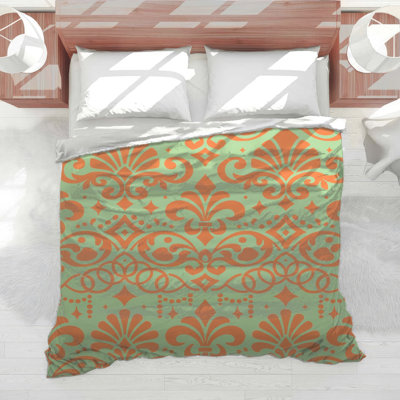 Édredon orange à motif damassé