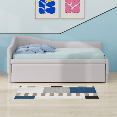 Upholstered L-Shaped Daybed With Pop Up Trundle