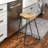 30 Inch Handcrafted Backless Counter Height Barstool, Natural Brown Mango Wood Saddle Seat, Black Iron Base