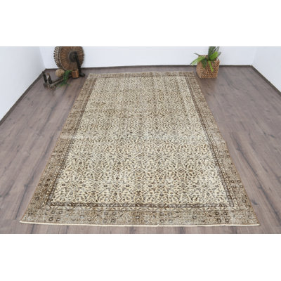 Tapis beige 73,3 x 115 po