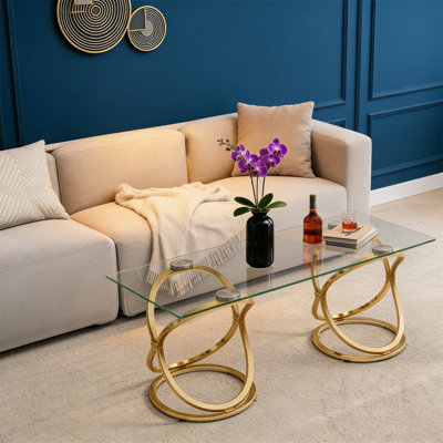 Table basse rectangulaire moderne en verre 31,50 "avec cadres en forme d'anneau, structure en métal et verre trempé transparent, table de centre de luxe pour le salon, la chambre à coucher et le bureau, or