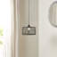 Luminaire suspendu en métal et en maille