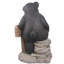 Ours tenant une pancarte et un gnome