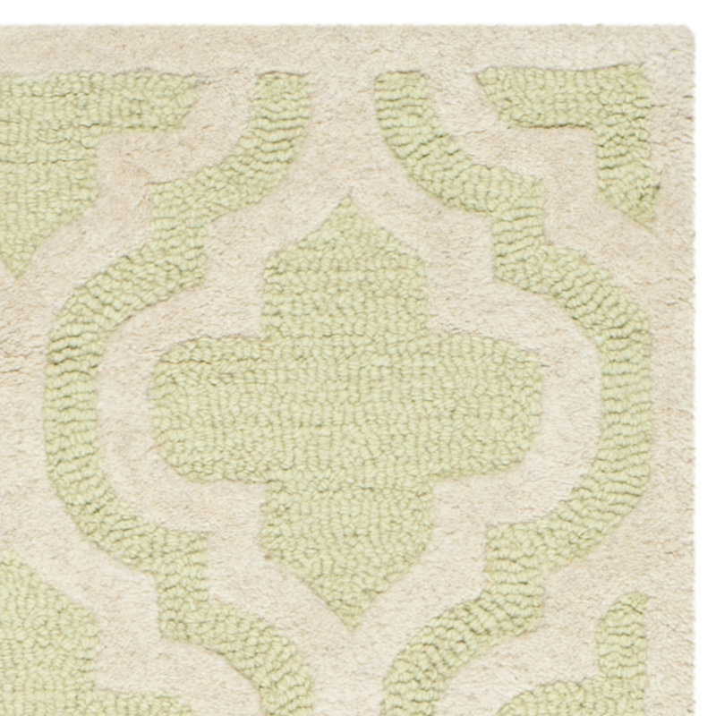 Handmade Light Green and Ivory Tufted Wool Round Rug