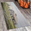 Tapis chic non tissé à motif floral complexe dans des tons terreux, parfait pour le salon ou la chambre à coucher-114334133