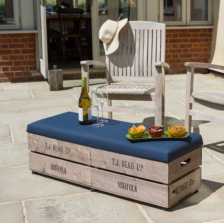 Edson Upholstered Pine Outdoor Ottoman with Sunbrella® Cushion, Blue