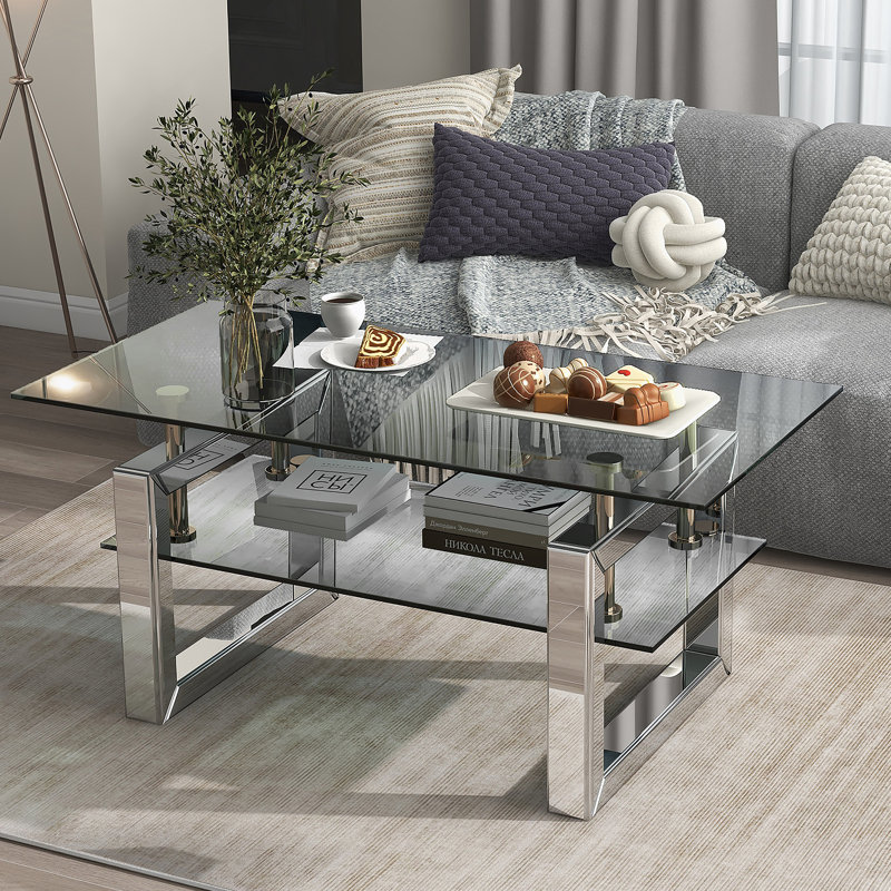 Table basse rectangulaire avec plateau en verre et tablette