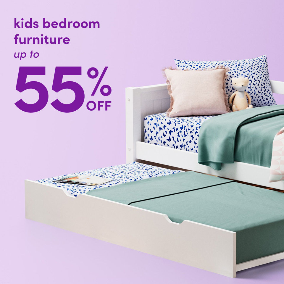 Kids bedroom furniture up to 55% off featuring a white trundle bed with butterfly patterned sheets and a plush toy.