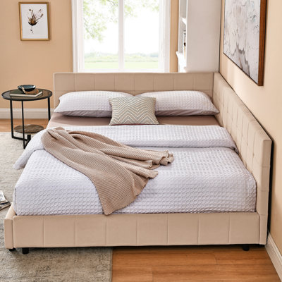 Grand lit avec revêtement en velours rose pour une chambre à coucher confortable et un accoudoir de lit de jour