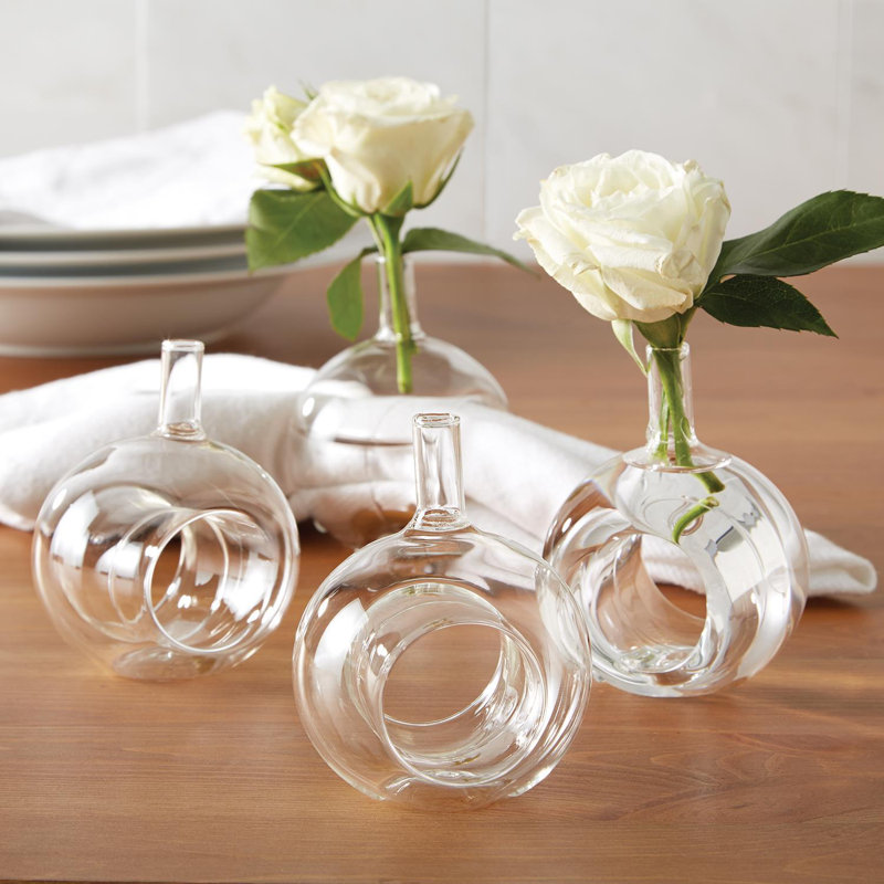 Ensemble de 4 rondelles de serviettes de table dans un joli vase