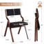 Chaise pliante au design élégant avec structure en bois massif et dossier et siège rembourrés capitonnés-1176982598
