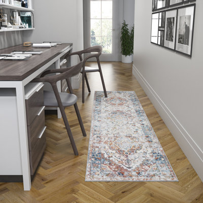 Tapis bleu / rouge / crème Fabriane