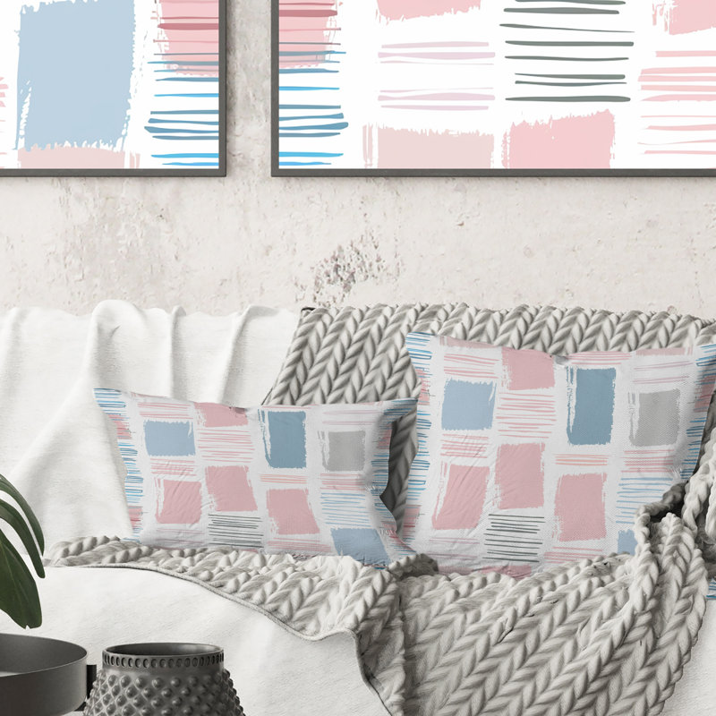Coussin lombaire à carreaux roses et bleus