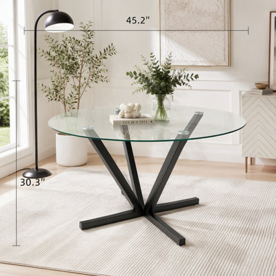 Table de salle à manger ronde en verre trempé avec pieds en métal argenté