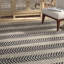 Tapis noir rayé en coton Dhurrie fabriqué à la main Alodie-677254871