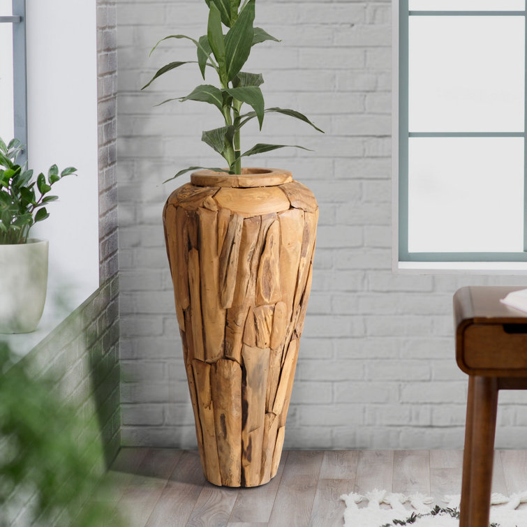 https://assets.wfcdn.com/im/64111213/resize-h755-w755%5Ecompr-r85/2024/202424215/Jamal+Handmade+Wood+Floor+Vase.jpg