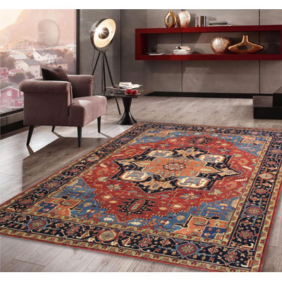 Tapis rouille / bleu marine en laine Serapi Collection
