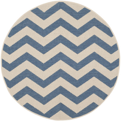 Tapis intérieur / extérieur à motif géométrique rouille / gris clair Arneshia