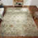 Stillings Wool Floral Area Rug in Ivory