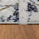 Madilin Abstract Machine Woven Polypropylene Area Rug in Ivory/Gray/Brown