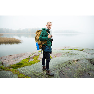 Man Exploring Finland by Suzi Media Production - Wrapped Canvas Print