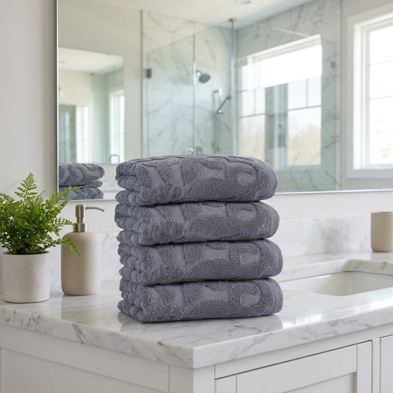 Ensemble de quatre serviettes de toilette grises à motifs floraux en coton turc, 40 x 75 cm
