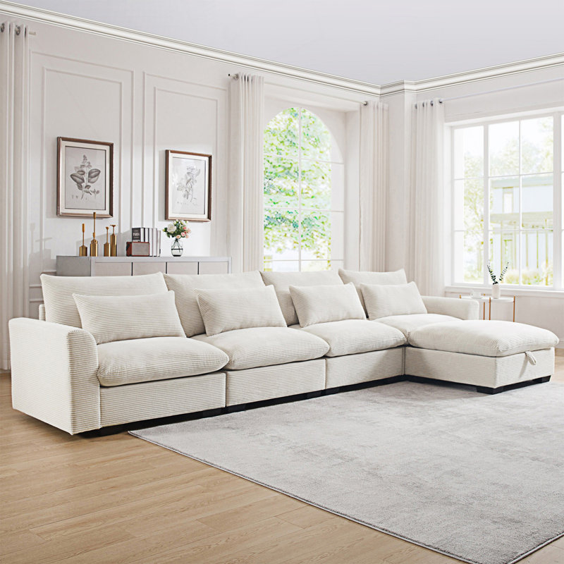 Grand canapé modulaire en forme de L avec repose-pieds avec rangement et 4 coussins de taille