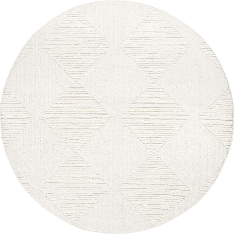 Kerry Textured Geometric Tasseled Area Rug