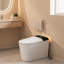 Toilettes intelligentes en céramique blanche et noire de 68,5 cm (27 pouces) avec bidet intégré, siège chauffant, chasse d'eau automatique et séchoir.