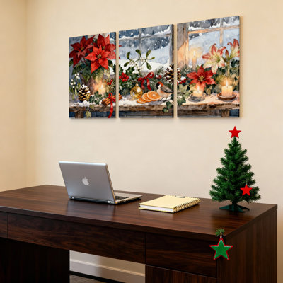 Ensemble de 3 toiles murales sur châssis représentant un poinsettia de Noël et une scène hivernale.