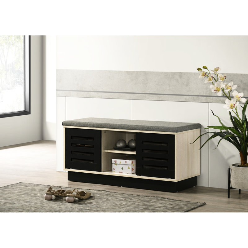 Armoire à chaussures attrayante avec dessus rembourré et porte coulissante