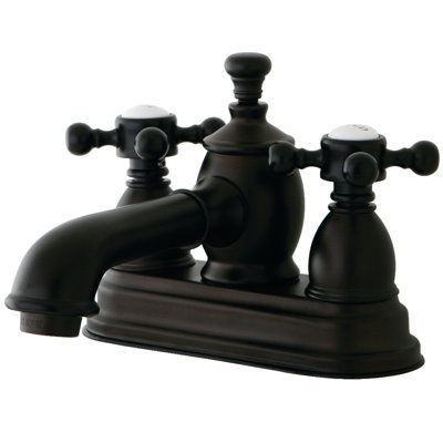 Kingston Brass English Country Two-Handle 3-Hole Deck Mount 4" Centerset Bathroom Faucet with Brass Pop-Up