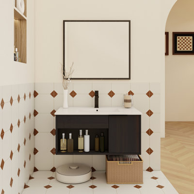 Meuble-lavabo flottant moderne en chêne foncé avec lavabo en céramique, tablette ouverte, porte à fermeture en douceur et conception compacte pour des salles de bain élégantes et fonctionnelles